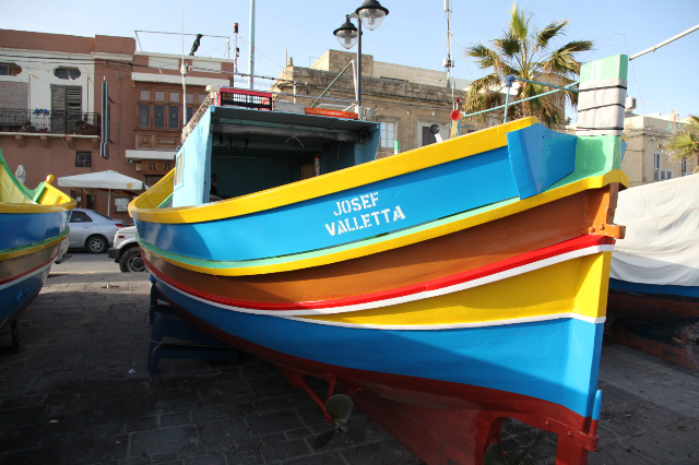 blue and yellow boat